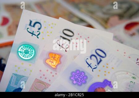 New British polymer money. The banknote 5, 10, 20 Sterling Pound notes which released by February 2020 in the United Kingdom. Stock Photo