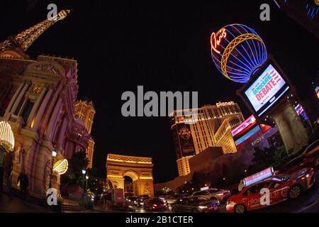 02192020 - Las Vegas, Nevada, USA: An advertisement for the Nevada debate shows on a screen the Paris Theater after the debate in Las Vegas, Nevada, Wednesday, Feb. 19, 2020. Stock Photo
