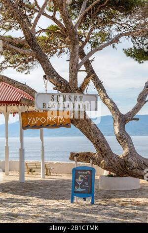 Daytime view of a popular sunset restaurant with a view of the Aegean Sea. Located on Hydra island in Greece Stock Photo