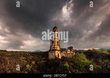 Church engulfed in lava, Paricutin volcano, state of Michoacan, Mexico, Central America Stock Photo