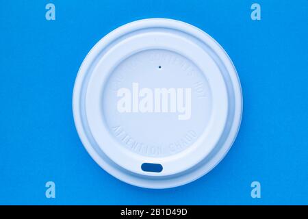 https://l450v.alamy.com/450v/2b1d49d/white-uline-paper-hot-cup-lid-paper-hot-cup-lids-single-use-coffee-cup-on-blue-background-2b1d49d.jpg