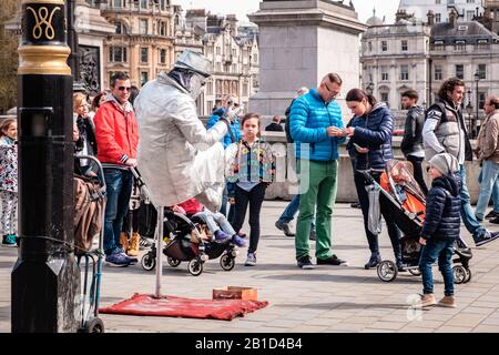 Street performer in Trafalgar Square, London, England Stock Photo