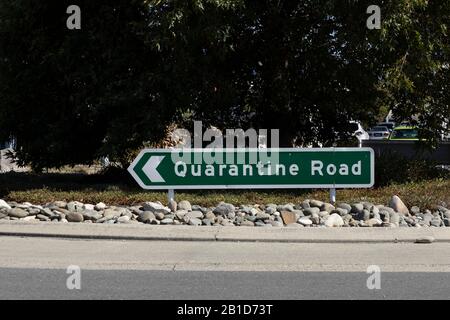 Quarantine Road sign on a roundabout in Nelson,  South Island, New Zealand. Stock Photo