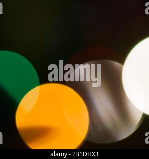 Colourful festive multi-colored circles . Defocused abstract multicolored bokeh lights background Stock Photo