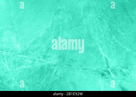 Mint marble texture. Natural patterned stone for background, copy space and design. Abstract marble stone surface. Trendy color. Tones of biscay green color. Stock Photo