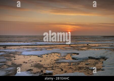 sunrise at the beach in winter, Netherlands, Texel Stock Photo