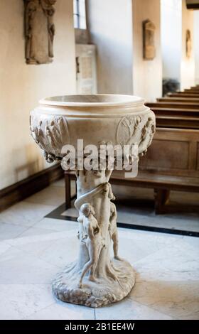 Baptismal font in St James's Church, Piccadilly, London, designed and constructed by Grinling Gibbons and where William Blake was christened. Stock Photo