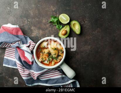 Sopa de mondongo, colombiano,  Latin America dish, soup made from diced tripe (the stomach of a cow or pig) slow-cooked Stock Photo