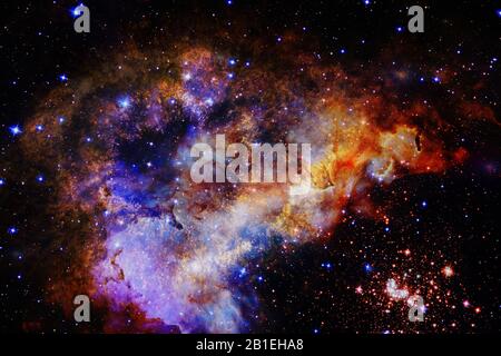Deep space art. Starfield stardust, nebula and galaxy. Elements of this image furnished by NASA. Stock Photo