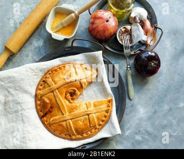 empanada de atun gallega - cake or tart spanish, is a type of baked or fried turnover consisting of pastry and filling, common in Latin America and Sp Stock Photo