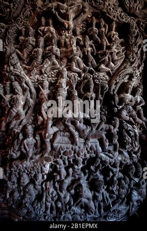 Thailand; Pattaya: The Sanctuary of Truth (Prasat Sut Ja-Tum), beautiful wooden temple covered in sculptures carved by hand, which construction, in ac Stock Photo