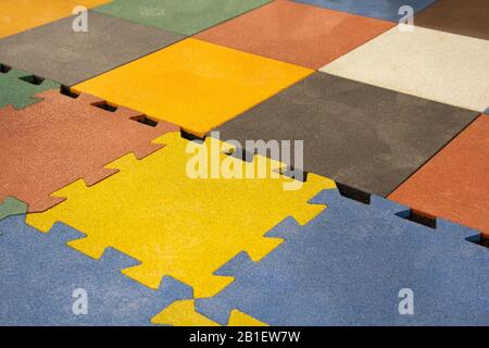 Tiles mats inside a play room, kindergarten school or gym Stock Photo