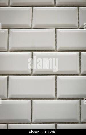 White ceramic bricks on the wall as background. Stock Photo
