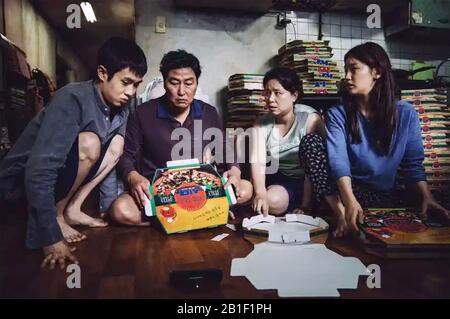 PARASITE 2019 Barunson E&A film with from left: Hye-jim Jang, Kang-ho Song, Woo-sik Choi, S0-dam Park Stock Photo