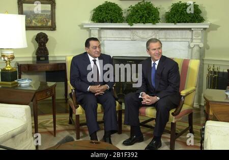 United States President George W. Bush meets President Hosni Mubarak of Egypt in the Oval Office at the White House in Washington, DC on Monday, April 2, 2001.Credit: Ron Sachs/CNP /MediaPunch