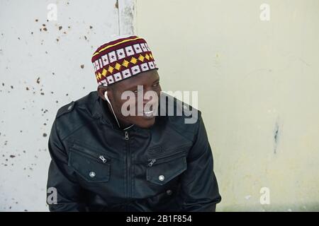 Nouadhibou, Mauritania, JANUARY 18, 2020: Close up portrait of smiling face of african man Stock Photo