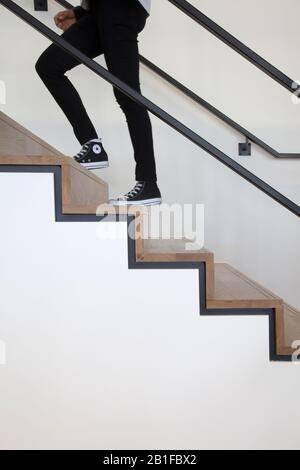 figure walking up stairs Stock Photo