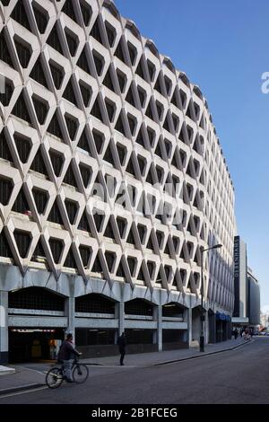 Perspective along exterior facade. Welbeck Street Car Park, London, United Kingdom. Architect: Michael Blampied and Partners, 1070. Stock Photo