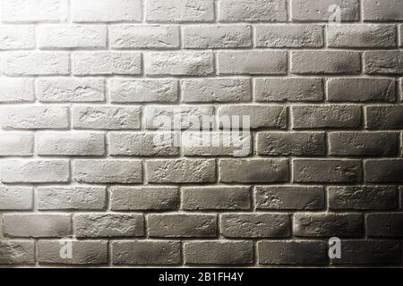 White brick wall, shadow and gradients, volume, from white to gray. Texture background for design and layouts. Stock Photo