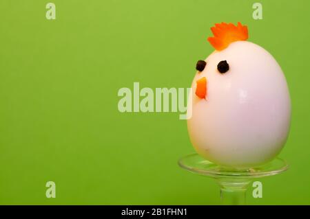 boiled egg in the shape of a chick. funny food. easter food. Stock Photo