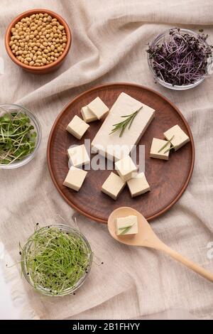 Vegetarian food concept. Microgreens and tofu with rosemary Stock Photo