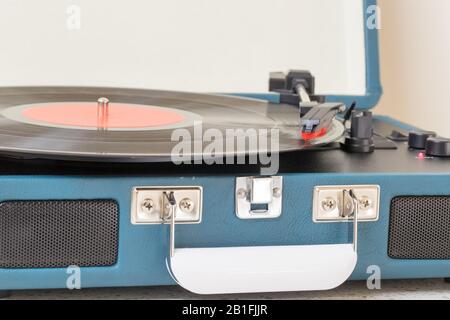 Vintage record player on the  table. - Image Stock Photo