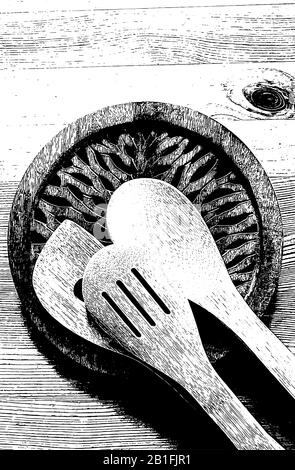 Black and white illustration with high contrast of a group of wooden spoons on a rustic wooden one in a family kitchen Stock Photo