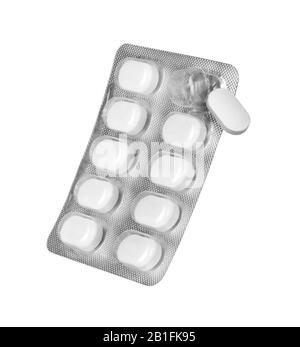 blister packs pills with a drop down pill on white background Stock Photo