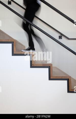 figure walking up stairs Stock Photo