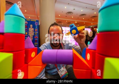 Jordan Willing, inventor of Blockaroos at the 117th North American International Toy Fair in the Jacob Javits Convention center in New York on Sunday, February 23, 2020.  The four day trade show with over 1000 exhibitors connects buyers and sellers and draws tens of thousands of attendees.  The toy industry generates over $26 billion in the U.S. alone and Toy Fair is the largest toy trade show in the Western Hemisphere. (© Richard B. Levine) Stock Photo