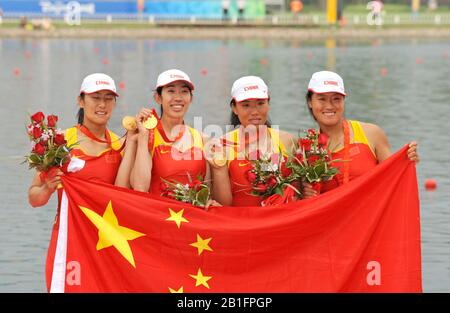 Shunyi, CHINA. Medal Presentation Gold  Medalist.  CHN W4X.  winning and celebrating the Gold medal at the 2008 Olympic Regatta, Shunyi Rowing Course.  Sun 17.08.2008.  [Mandatory Credit: Peter SPURRIER, Intersport Images.  Gold medalist CHN W4X left to right  Bin Tang, Jin Ziwei, Aihua Xi, Yangyang Zhang)  Bronze medalist GER W4X left to right Britta Oppelt, Manuela Lutze, Kathrin Boron, Stephanie Schiller) Stock Photo