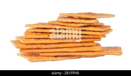 crackers pile on white background. creative photo. Stock Photo
