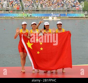 Shunyi, CHINA. Medal Presentation Gold Medalist.  CHN W4X.  winning and celebrating the Gold medal at the 2008 Olympic Regatta, Shunyi Rowing Course.  Sun 17.08.2008.  [Mandatory Credit: Peter SPURRIER, Intersport Images   crew China (Bin Tang, Jin Ziwei, Aihua Xi, Yangyang Zhang) Stock Photo