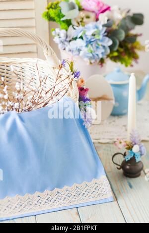 Close-up blue cloth with crocheted edging on wicker basket Stock Photo