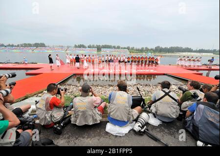 Shunyi, CHINA. Medal Presentation.  Women's Eights. left to right, NED W8+ silver medalist, Centre USA W8+ Gold Medalist and Bronze medalist ROM W8+2008 Olympic Regatta, Shunyi Rowing Course.  Sun 17.08.2008.  [Mandatory Credit: Peter SPURRIER, Intersport Images. Stock Photo