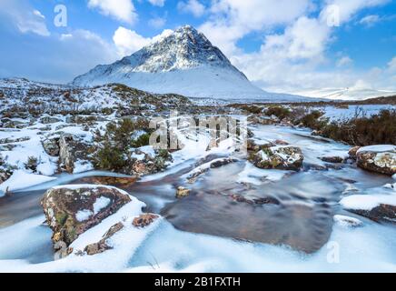 Snow covered Buachaille Etive Mor and the River Coupall Rannoch moor Glencoe Scottish Highlands Scotland UK GB  Europe