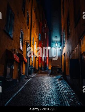 Beautiful cozy night narrow street in Gamla Stan - old town of Stockholm. Stock Photo