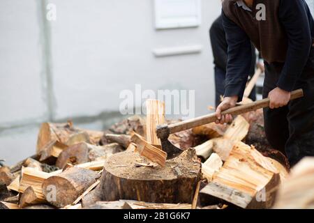 Woodcutters who break wood with an axe in Turkey Stock Photo