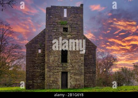 The Old Semple Ruins at Castle Semple in Renfrewshire Scotland at a Blazing Red sunset