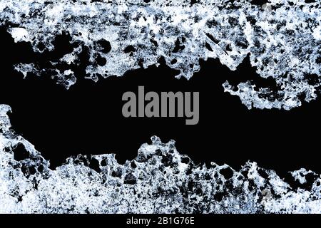 Melting natural Ice Isolated on black background Stock Photo