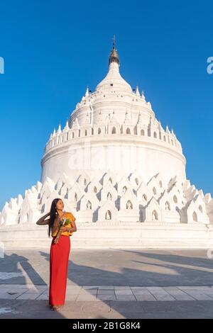 Beautiful young Burmese woman at Hsinbyume Pagoda, Mingun, Mandalay Region, Myanmar Stock Photo