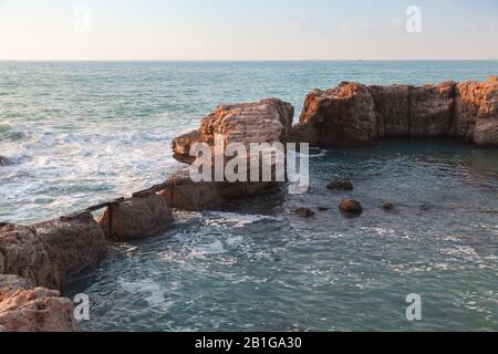 Coastal landscape with old fortifications and stormy Mediterranean Sea. Montazah beach, Alexandria, Egypt Stock Photo