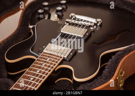 Gibson ES 339 Style Semi-Hollow Body Electric Guitar Close-up in case on a wooden background Stock Photo