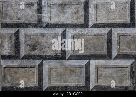 Beautiful painted facade decoration on a castle wall. grunge look. Stock Photo
