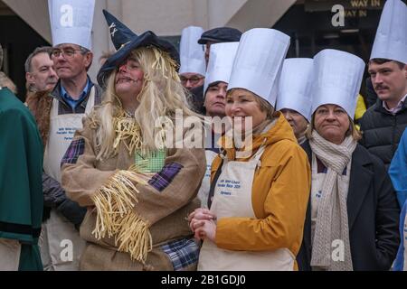 London, UK. 25th February 2020. Farmers. The City of London's Livery companies take part in the Inter-Livery pancake races in Guildhall Yard, a tradition begun by the Worshipful Company of Poulterers in 2005 supporting the Lord Mayor's Charity. Poulterers supply eggs for the pancakes, Clockmakers time the races, Gunmakers fire a starting gun and Fruiterers provide the lemons. As well as competitions for Masters and members of the companies there is also a fancy dress class, with some interesting contributions reflecting the livery companies and the charity. Peter Marshall/Alamy Live News Stock Photo