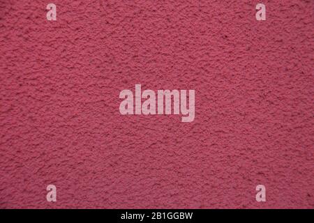 New pink cement wall. Beautiful concrete stucco. painted cement. background texture wall. Stock Photo