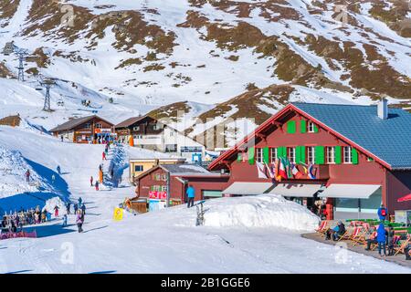 KLEINE SCHEIDEGG, SWITZERLAND - JANUARY 16, 2020: Kleine Scheidegg is a mountain pass, situated below and between the Eiger and Lauberhorn peaks Stock Photo