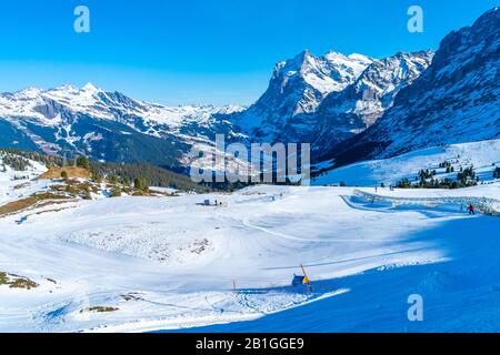 KLEINE SCHEIDEGG, SWITZERLAND - JANUARY 16, 2020: Kleine Scheidegg is a mountain pass, situated below and between the Eiger and Lauberhorn peaks Stock Photo