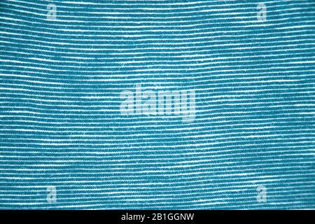Art deco close-up of stripped fabric texture. Blue texture background. Stock Photo