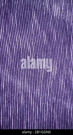 Vertical Art deco close-up of stripped fabric texture. Blue texture background. Stock Photo